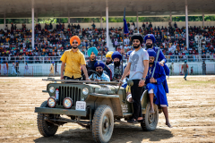 Group-of-Sikh-in-Jeep-in-front-of-the-grandstand